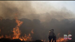 Wildfires in Greece prompt massive evacuations, leaving tourists in limbo