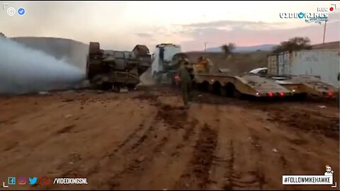 Israeli army loading a Merkava Tank on carrier flips | FAIL