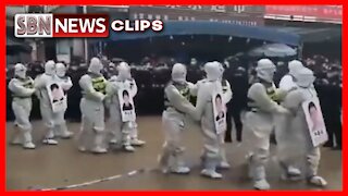 CHINESE POLICE PUBLICLY SHAME COVID LOCKDOWN VIOLATOR'S BY PARADING THEM THROUGH STREETS - 5734