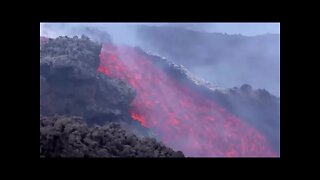 lava flows out from Italy's Mount Etna