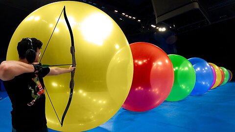 How Many Giant Balloons Stops An Arrow? | How Ridiculous
