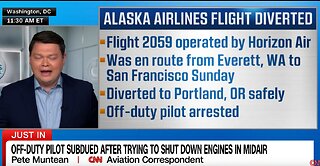 An off-duty pilot tried to take control of Alaska Airlines flight