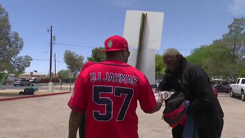 Local DJ helps keep the homeless hydrated as triple digits near