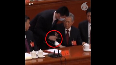 Hu Jintao: ex-president escorted out of China party congress