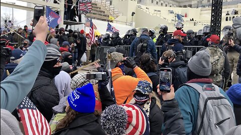 Rioter Comes After Press Photog with 2x4 on January 6