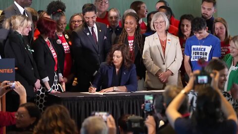 Gov. Gretchen Whitmer signs gun reform laws at Michigan State