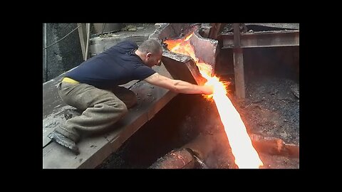 Man Puts Hand In Molten Metal