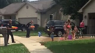 Police Officers Take Part In Good Old Super Soaker Fight