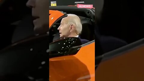 Biden revs up Corvette at Detroit Auto Show 2022.
