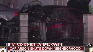 Car arson shuts down neighborhood