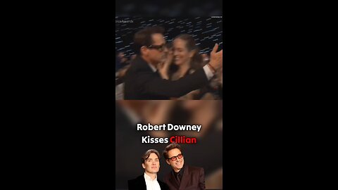 Moment Robert Downey kisses Cillian Murphy at Critics Choice Awards