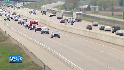 Slain firefighter's body escorted to Appleton funeral home