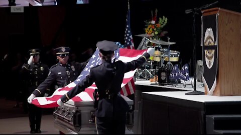 Officer Gordon Beesley funeral: Taps and folding of the flag