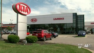 Lawrence Kia customer claims car dealer forged documents