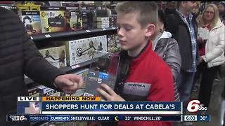 Camouflaged shoppers hunt for deals at Cabela's