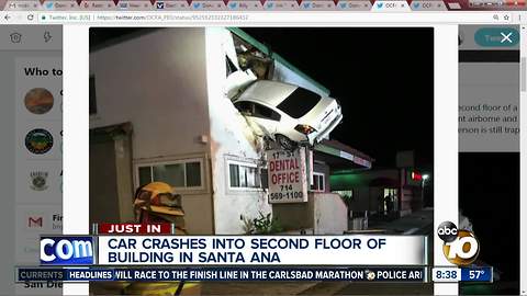 Car crashes into second floor of building in Santa Ana