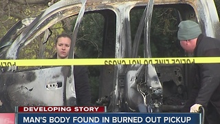 Man's body found in burned out pickup truck