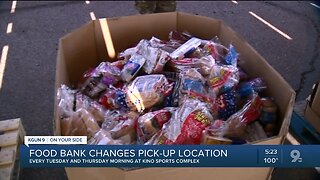 Food bank distributes food those in while social distancing