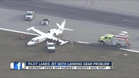 Twin engine plane missing a wheel lands safely at Sarasota-Bradenton International Airport