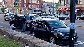 Boston police conducting a motor vehicle stop at the intersection of Columbia Road and Blue Hill Ave