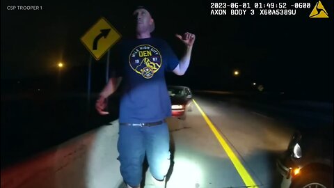 man takes off in vehicle after being tased and tries to run across a busy interstate at night.