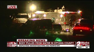 Officials investigating homicide after body recovered from water in Ottawa County