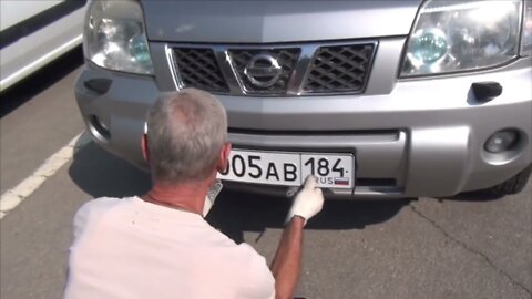 First Russian-standard numberplates and driving licenses issued in Kherson