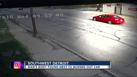 Police working to identify body in burned car on Detroit's west side