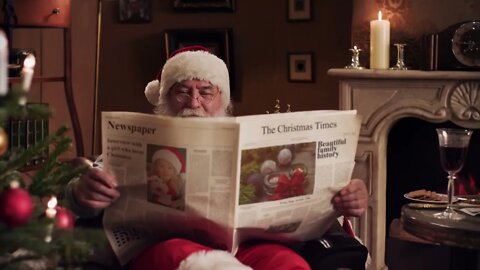 Santa Claus Reading The Newspaper