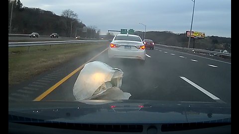 Multiple vehicles strike object on highway. Front and rear dashcam footage.