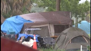 John Prince Park inhabitants wait for emergency shelter amid storms, flooding