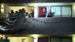 Man in custody after SWAT standoff in Springfield Township