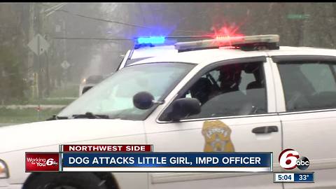 Dog bites girl, police officer on Indy's northwest side