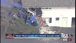 Garbage truck hits house in Prairie Village
