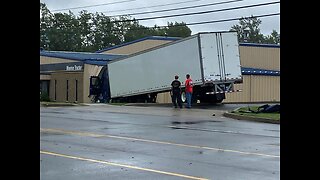 Tractor trailer crashes into Monroe Tractor on Genesee Street
