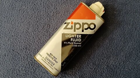 SHOW AND TELL [64] : ZIPPO LIGHTER FLUID STEEL BOTTLE, $.89 cent sticker price (1980s? 1990s?)