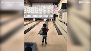 Lad pulls off incredible strike at bowling alley