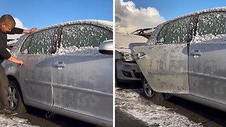 Dude hilariously brakes frozen door from Volkswagen car