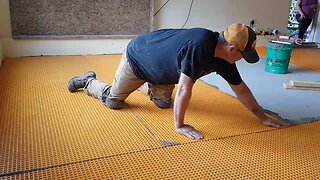 Laying Uncoupling Membrane. Protect Floor From Cracking. DIY