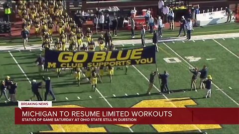 Michigan to resume limited workouts