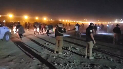 Footage released of migrants at the southern border crossing over into the U.S.