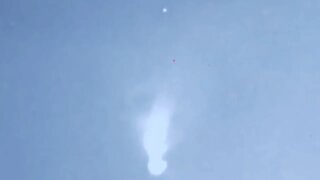 UFO spotlighted by jet