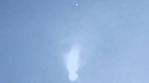 UFO spotlighted by jet