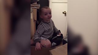 Little Boy Gets Stuck In Cardboard Box