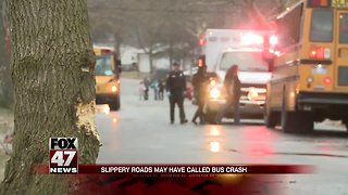 No injuries reported when Lansing school bus hits tree