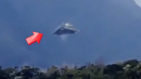 Pyramid-shaped UFO descends into the mountains [Space]