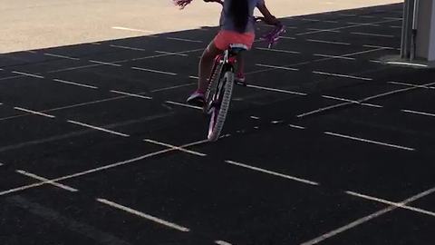 Girl Learning To Ride A Bike Runs Into Pole