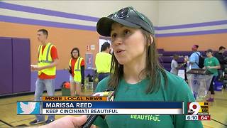 Volunteers work to clean Avondale