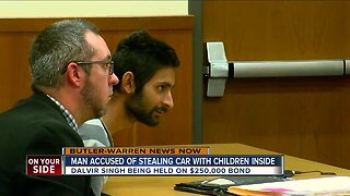Bond set for man accused of stealing car with kids inside