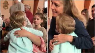 Adorable girl hugs people at an Oklahoma church
